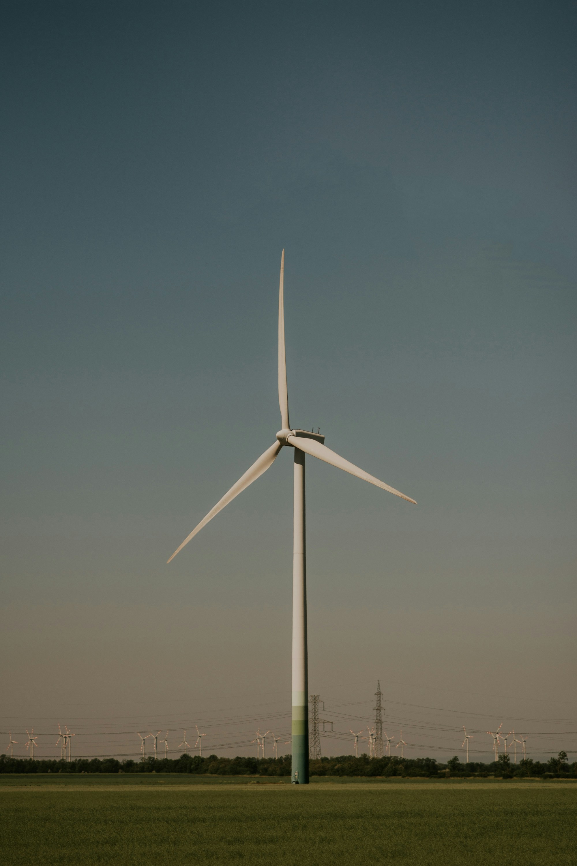 Wind turbine and transmission lines in an agricultural landscape
